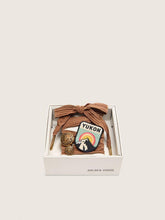Golden Goose Skins burgundy and peach embroidered laces with patch and two charms