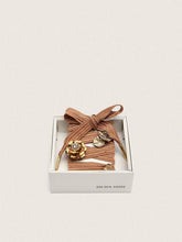 Golden Goose Skins burgundy and peach embroidered laces embellished with charms