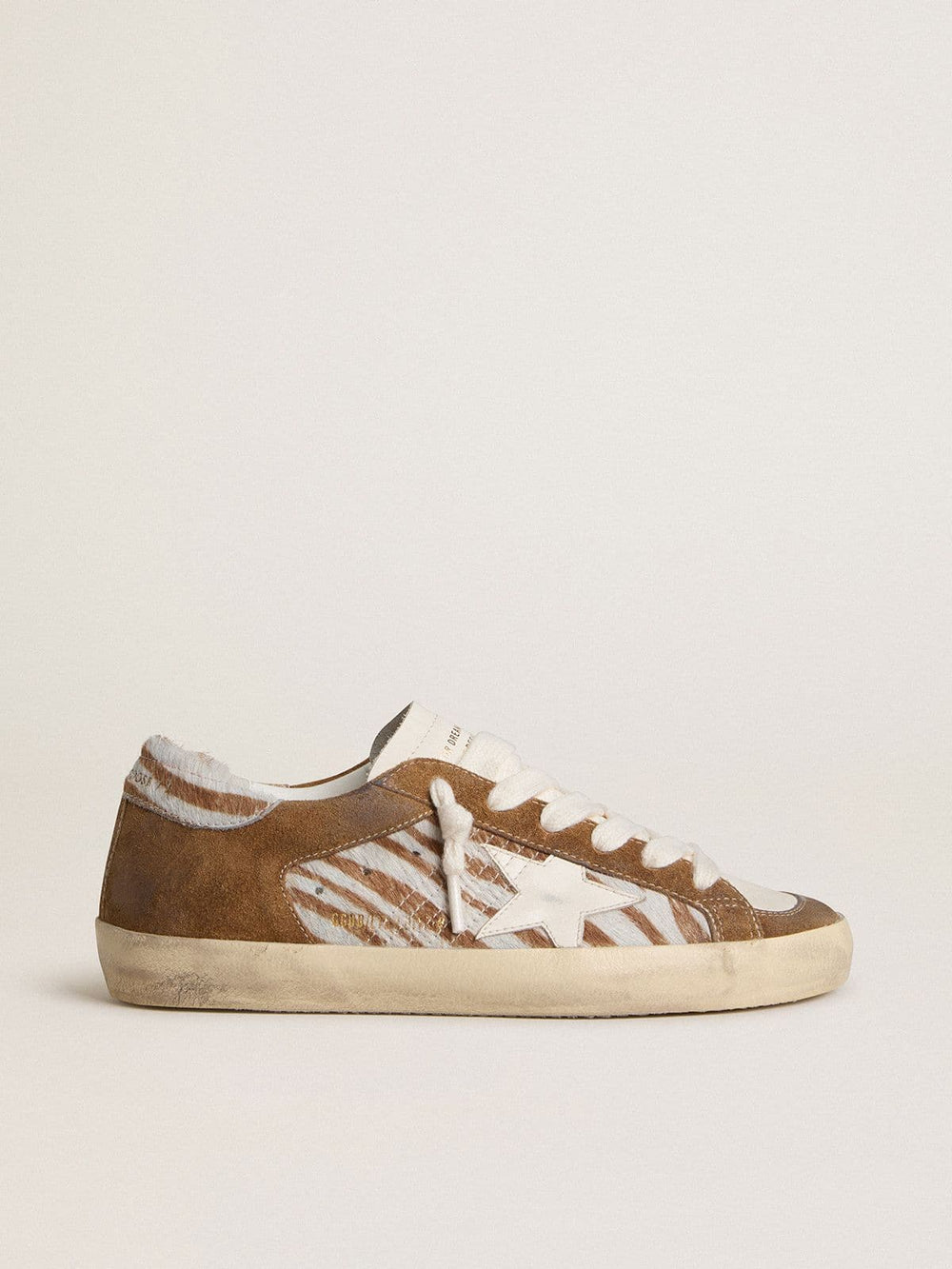 Golden Goose Women's Super-Star in zebra-print pony skin with leather star and brown suede inserts
