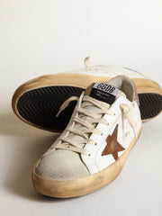 Golden Goose Super-Star with a tan star and pink glitter heel tab