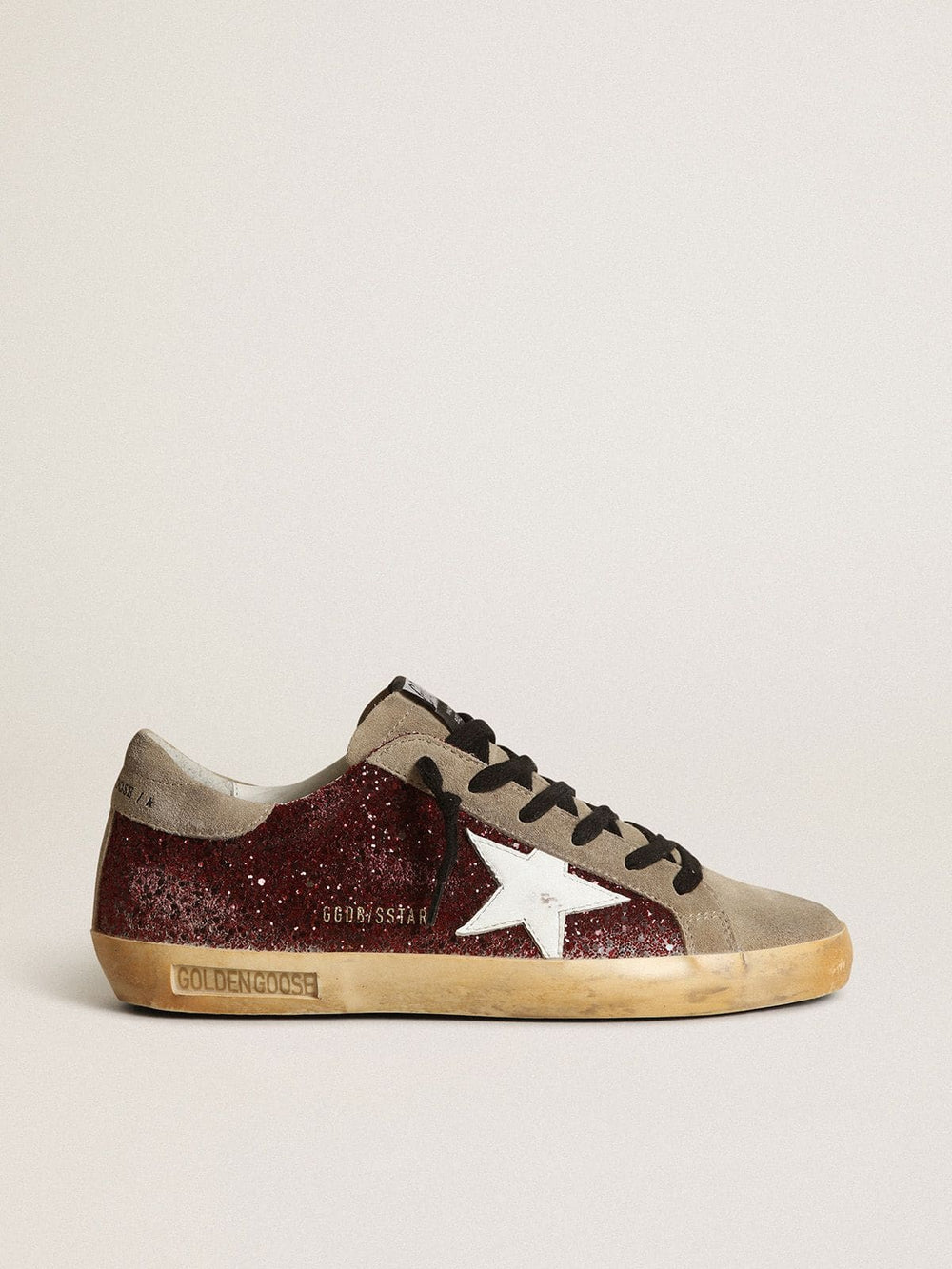Golden Goose Women's Super-Star in burgundy glitter with white leather star and dove-gray suede tongue