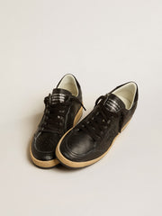 Golden Goose Women’s Ball Star in black nappa with black glitter star and suede heel tab