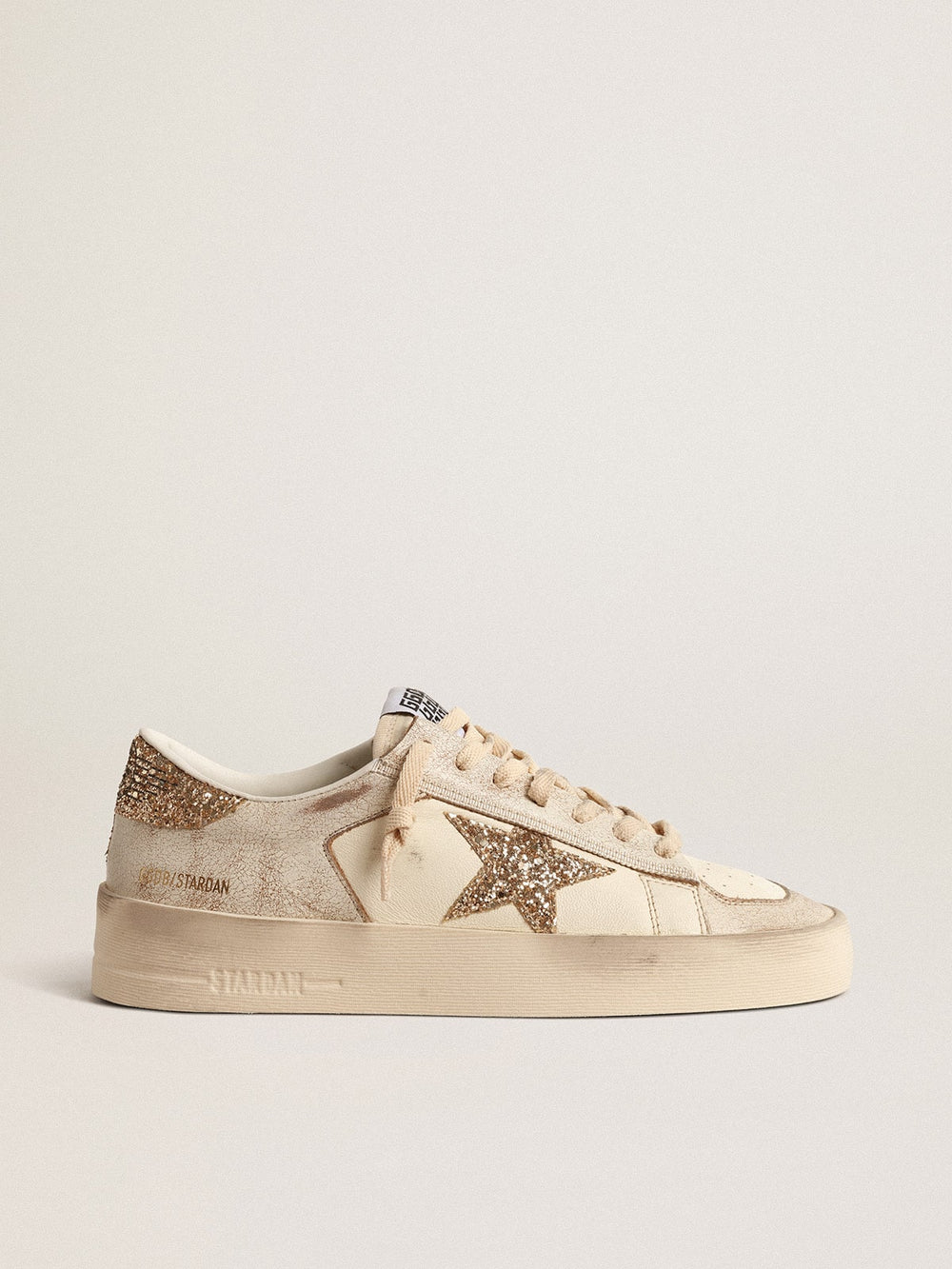 Golden Goose Women’s Stardan in ecru nappa leather with gold glitter star and heel tab