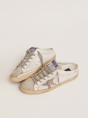 Golden Goose Super-Star Sabot with a platinum glitter star and suede tongue