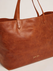 Golden Goose Pasadena Bag in tan-colored glossy hammered leather with gold logo on the front
