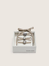 Golden Goose Skins braided gold-colored laces with shimmering charms