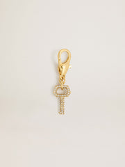 Golden Goose Key-shaped charm in gold-colored brass with crystals
