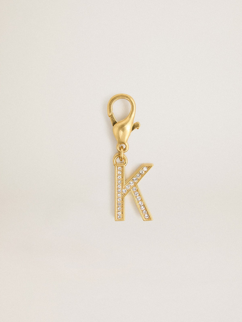 Golden Goose Letter K charm in gold-colored brass with crystals