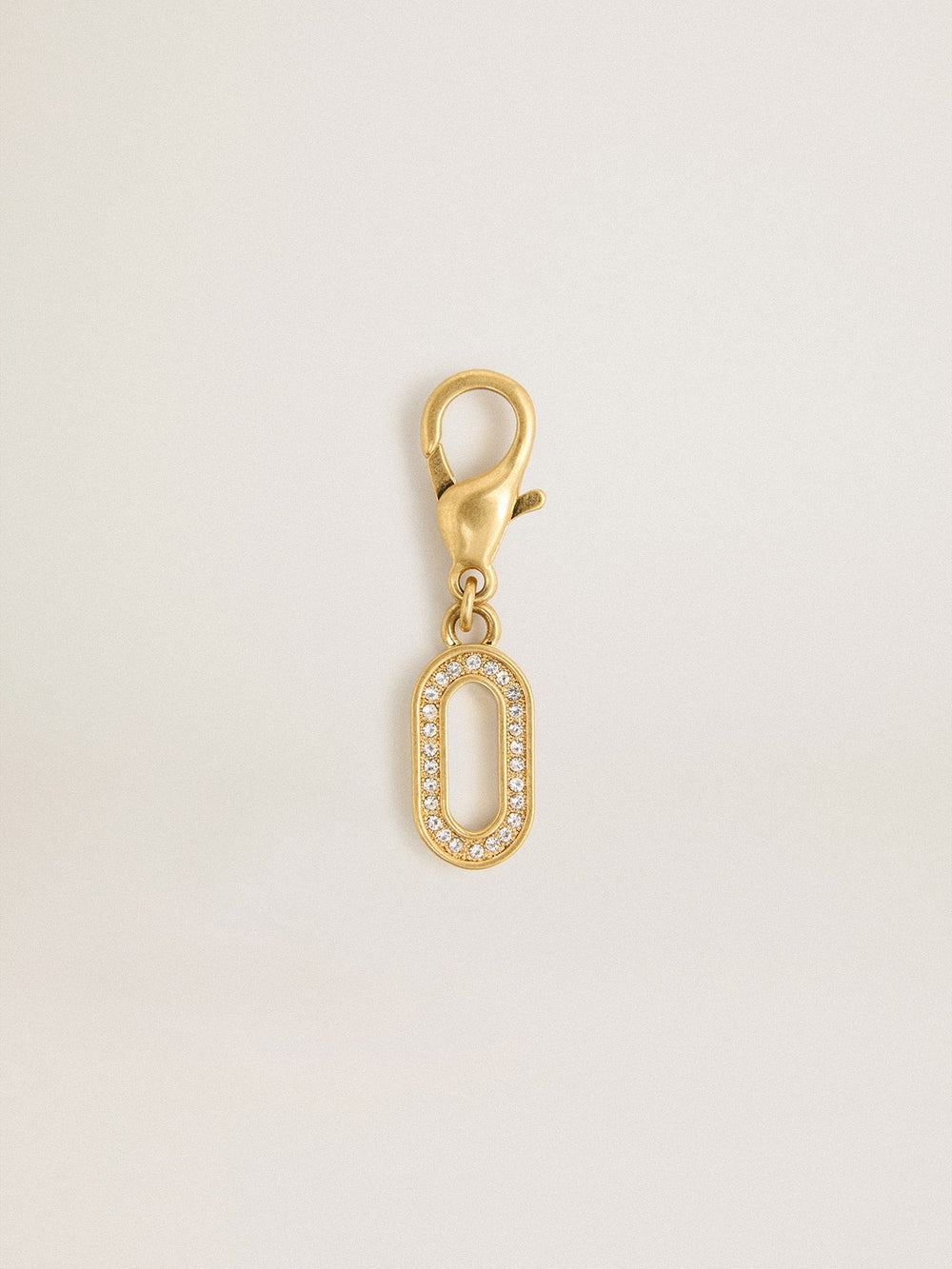 Golden Goose Letter O charm in gold-colored brass with crystals