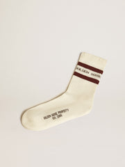 Golden Goose Worn-white socks with distressed details and brown stripes
