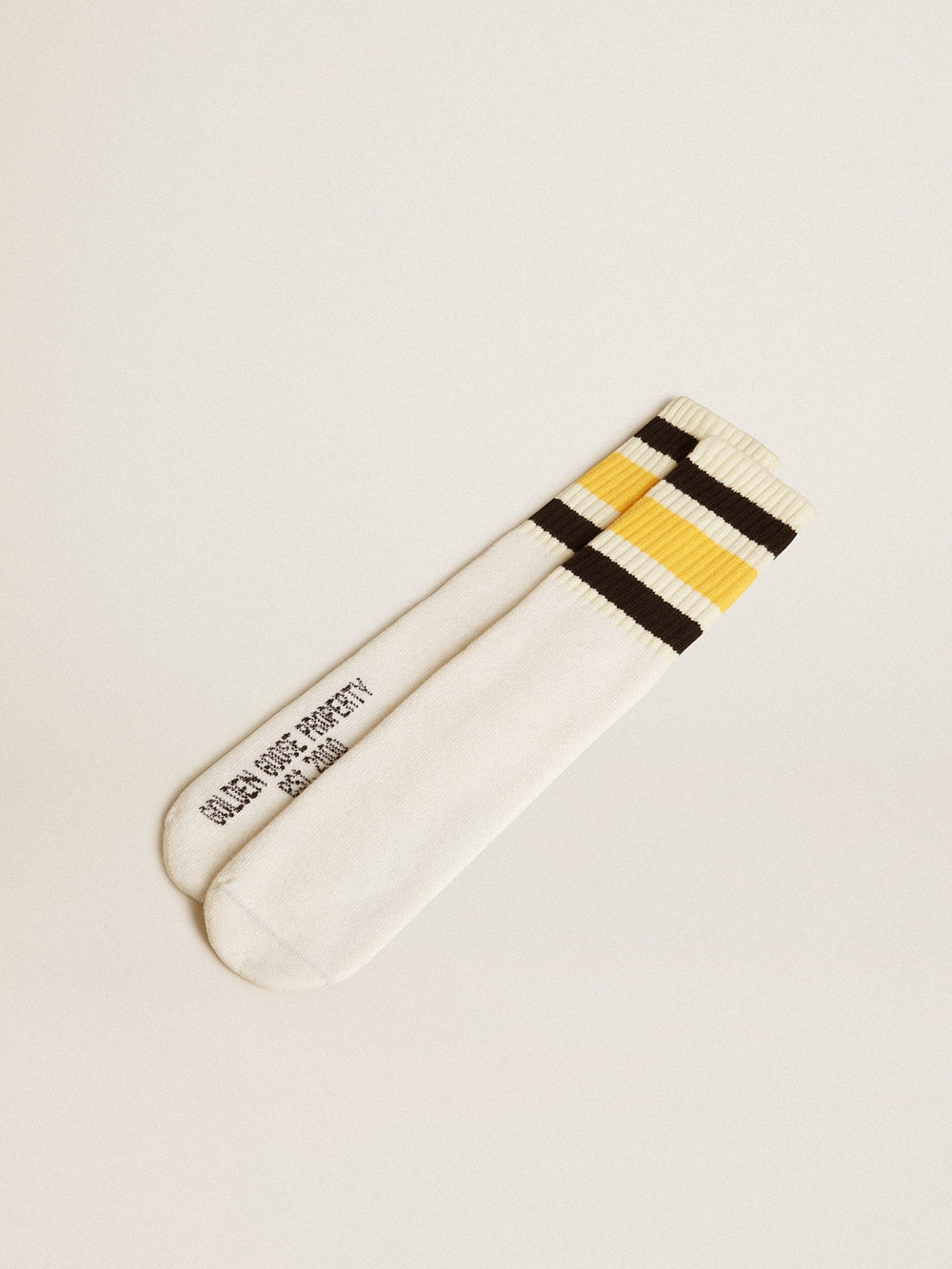 Golden Goose Worn-white socks with distressed details and black and yellow stripes
