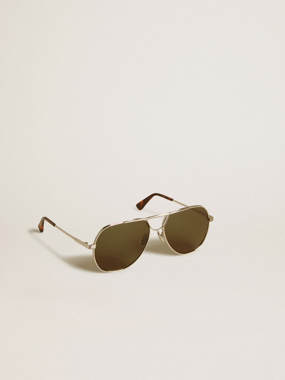 Golden Goose Aviator sunglasses with silver frame and green lenses