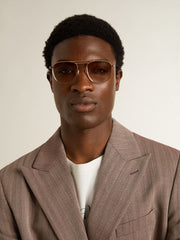 Golden Goose Aviator-style sunglasses with gold frame and beige lenses