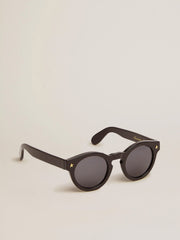 Golden Goose Sunframe Panthos model with black frame and gold details