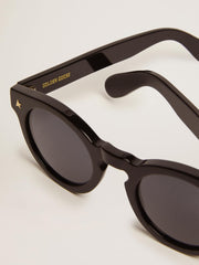 Golden Goose Sunframe Panthos model with black frame and gold details