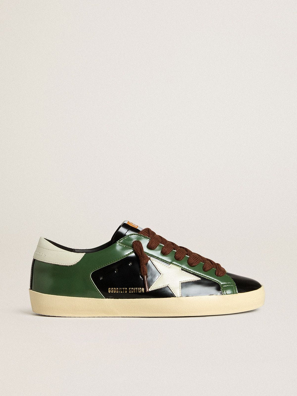 Golden Goose Men’s Super-Star LTD in black laminated leather with white leather star and heel tab