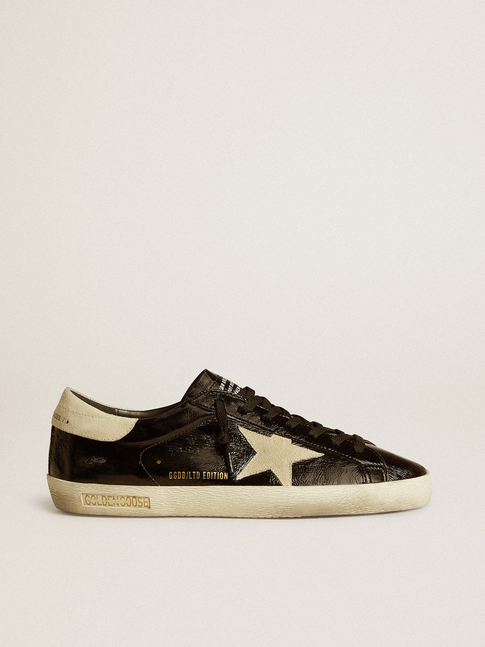 Golden Goose Men's Super-Star in black patent leather with suede star and heel tab