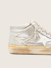 Golden Goose Men’s Mid Star in silver metallic leather with ivory star