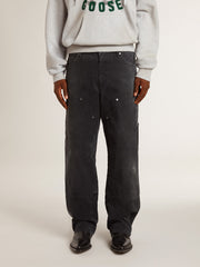 Golden Goose Men's distressed black cotton jeans with front patches