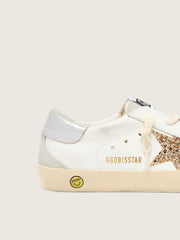 Golden Goose Junior Super-Star with gold glitter star and silver metallic leather heel tab