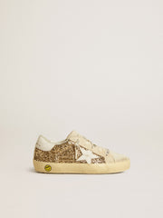 Golden Goose Super-Star Young in gold glitter with white leather star and heel tab