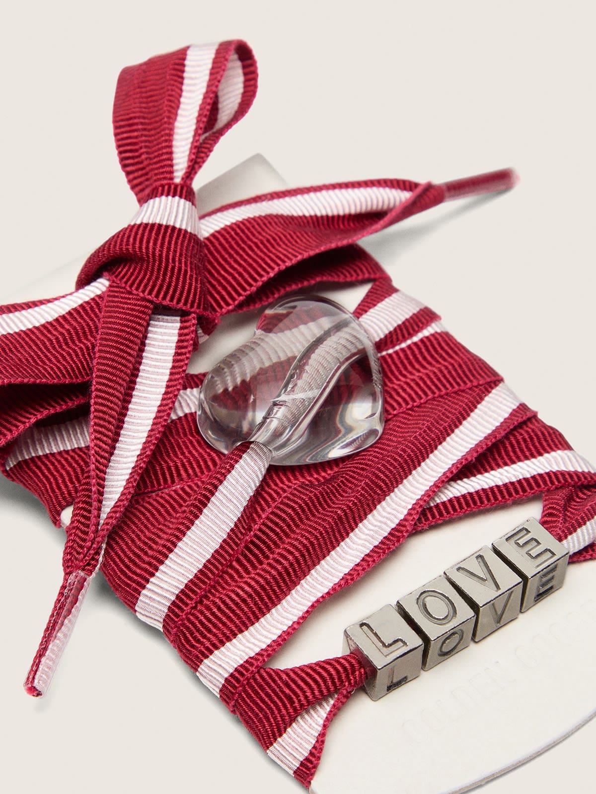 Golden Goose Skins red and white striped laces with charms