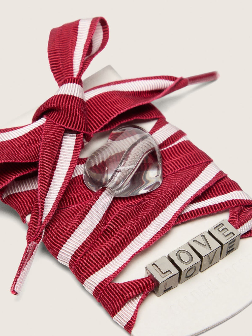 Golden Goose Skins red and white striped laces with charms