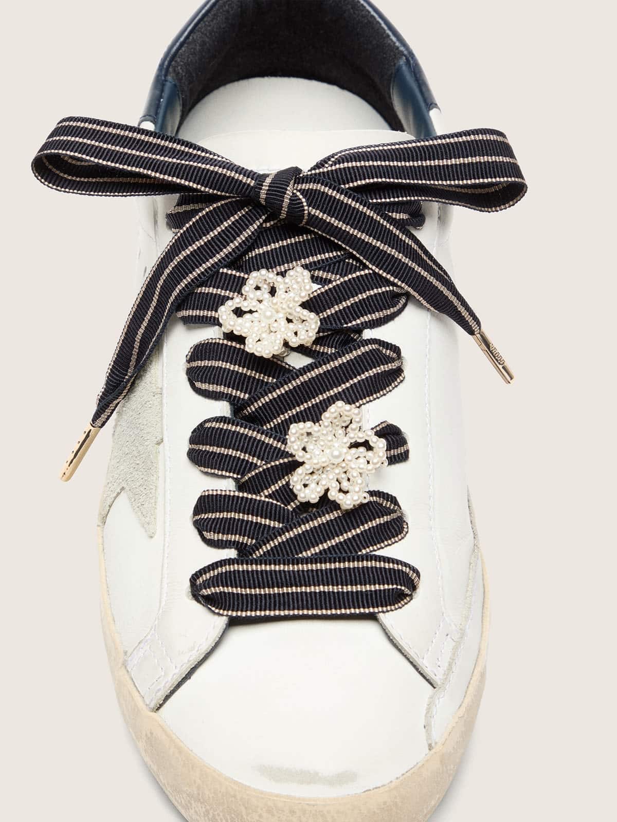 Golden Goose Skins white and dark blue striped laces with beaded charms