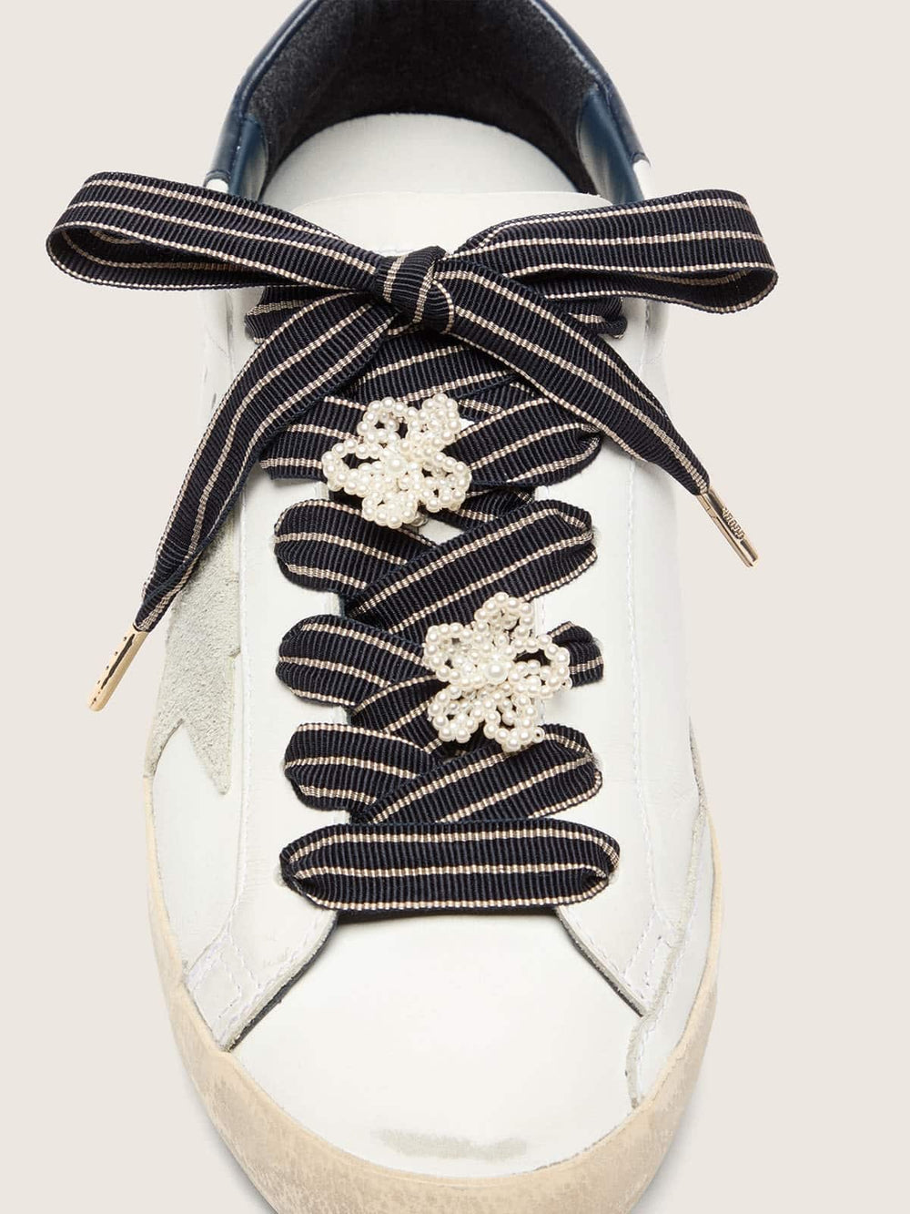 Golden Goose Skins white and dark blue striped laces with beaded charms