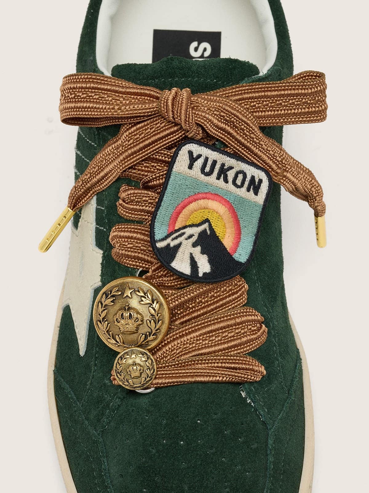 Golden Goose Skins burgundy and peach embroidered laces with patch and two charms