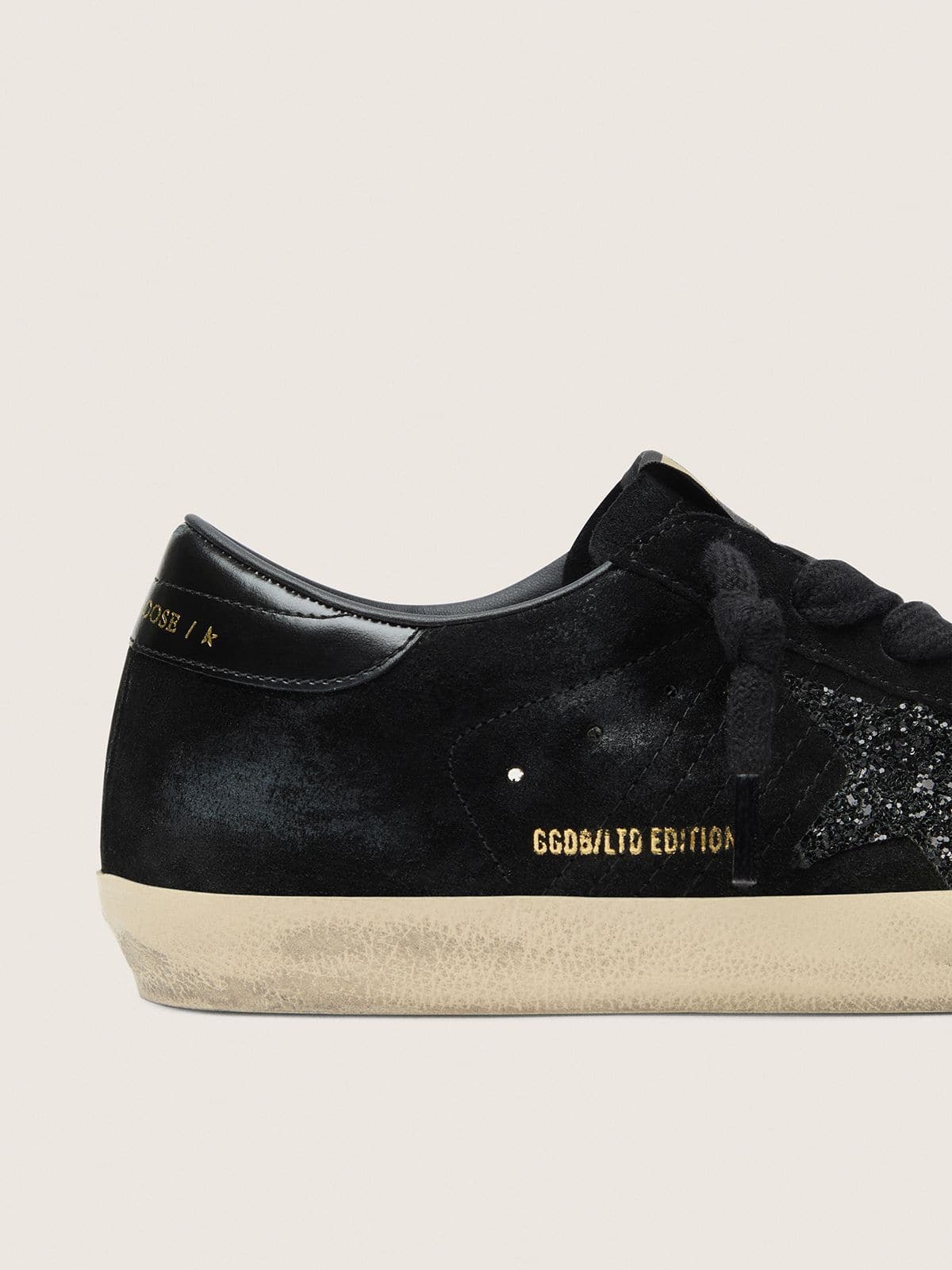 Golden Goose Women's Super-Star LTD in black suede with black glitter star and black leather heel tab