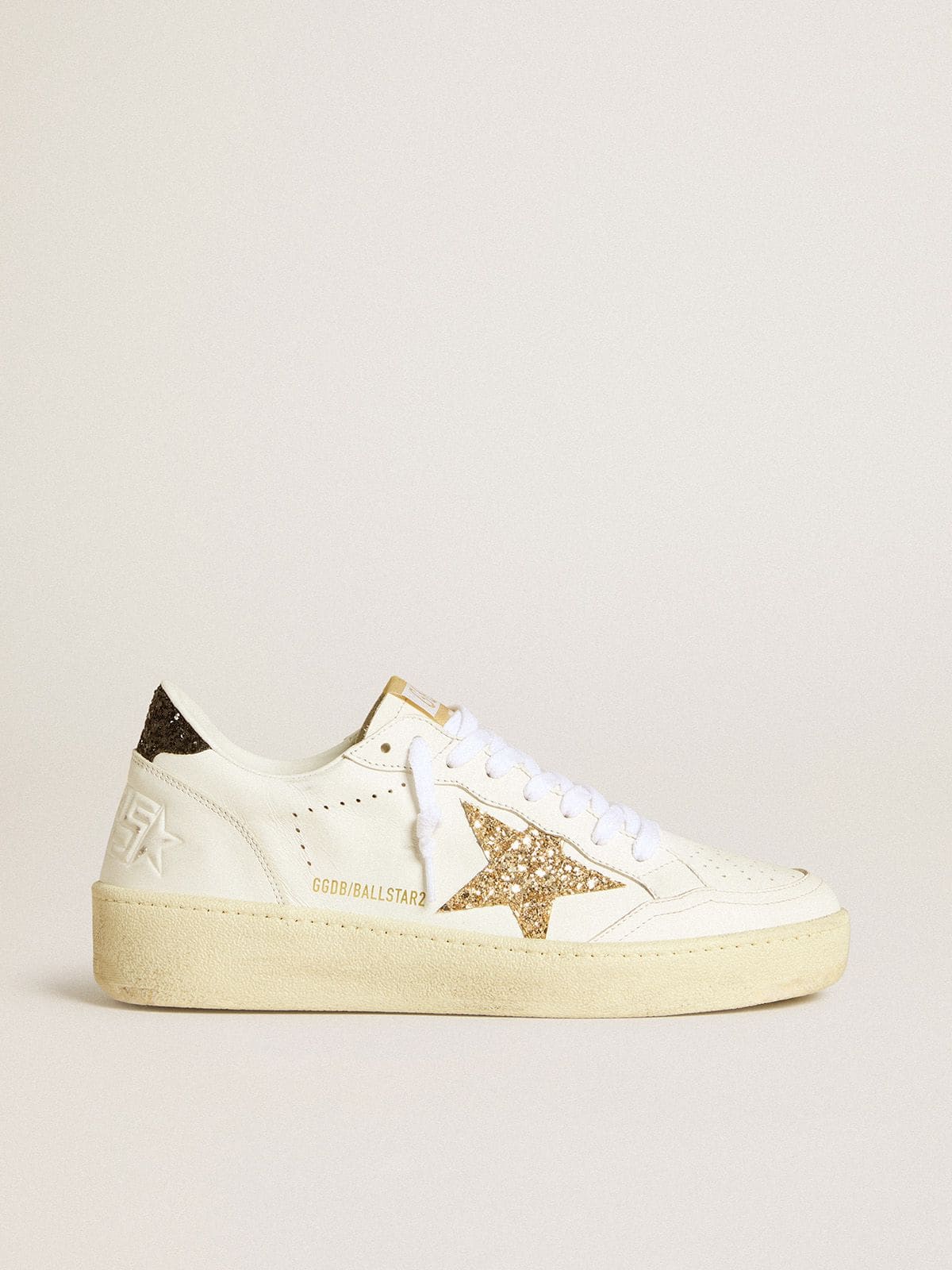 Golden Goose Women’s Ball Star in white leather with gold glitter star and black glitter heel tab