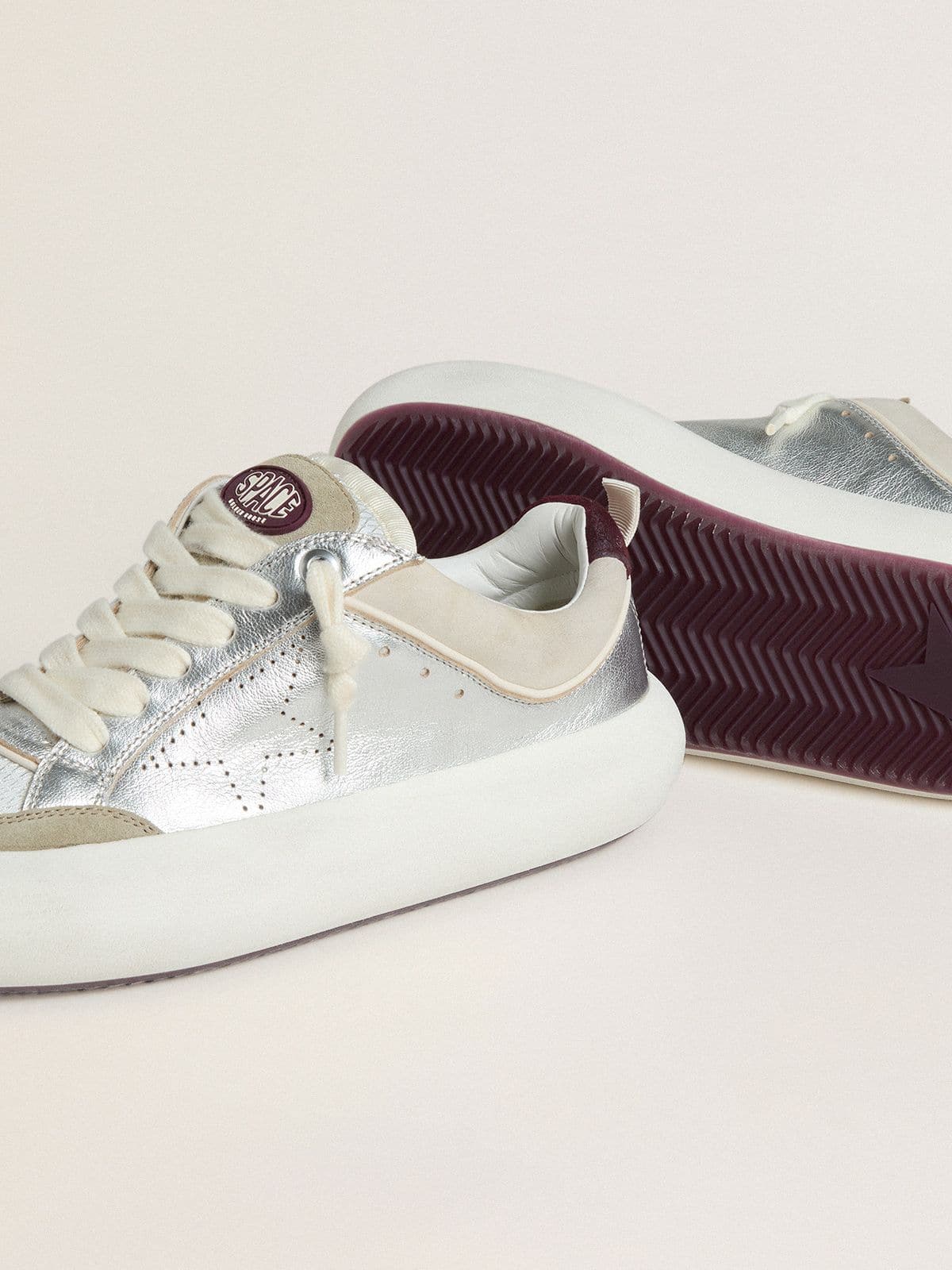 Golden Goose Women’s Space-Star Cube in ice-gray and silver leather with burgundy heel tab