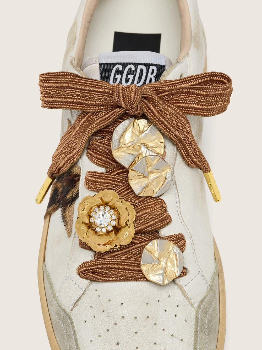 Golden Goose Skins burgundy and peach embroidered laces embellished with charms