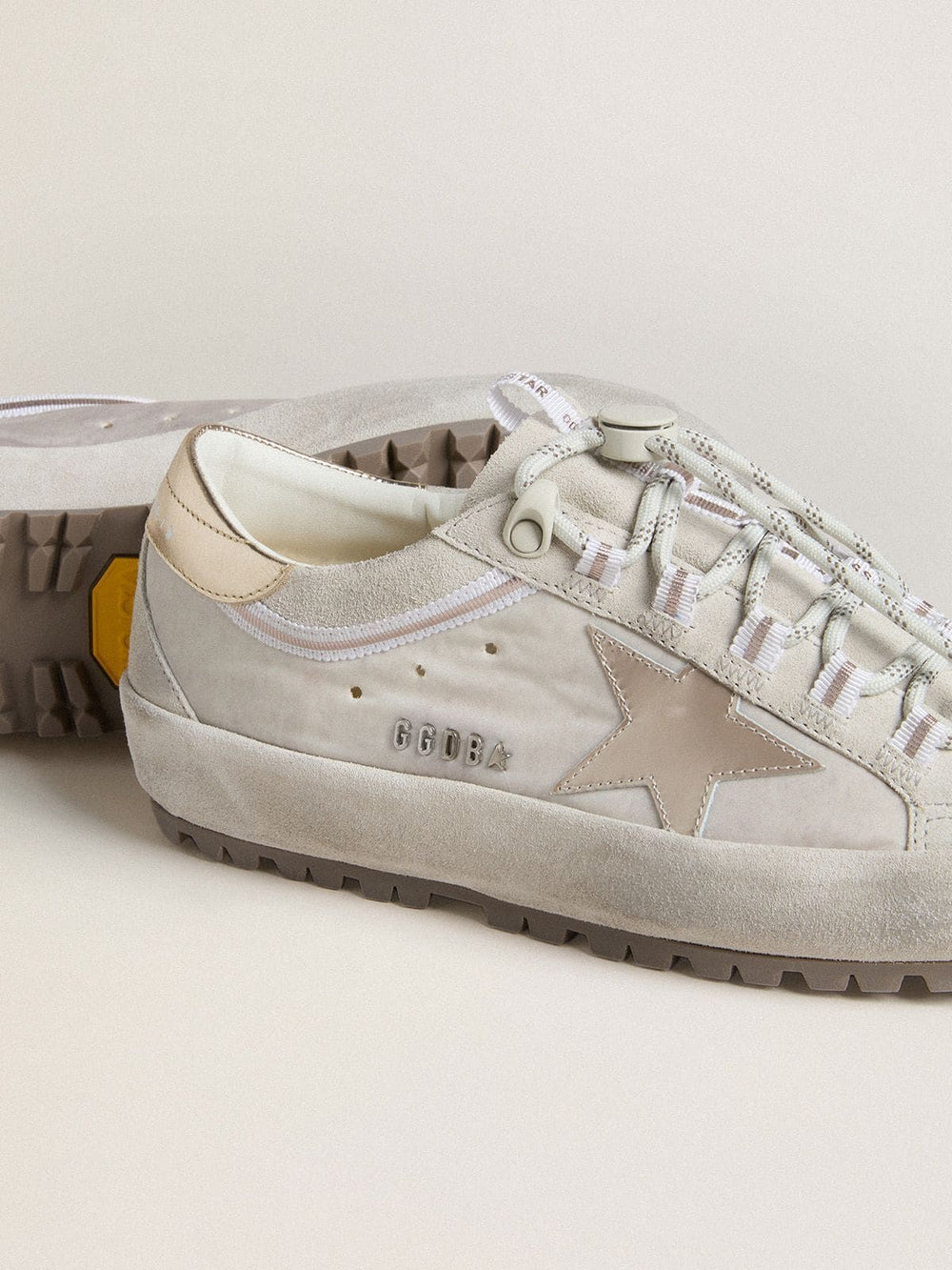 Golden Goose Women's Super-Star Ski in light gray nylon with metallic leather star and heel tab