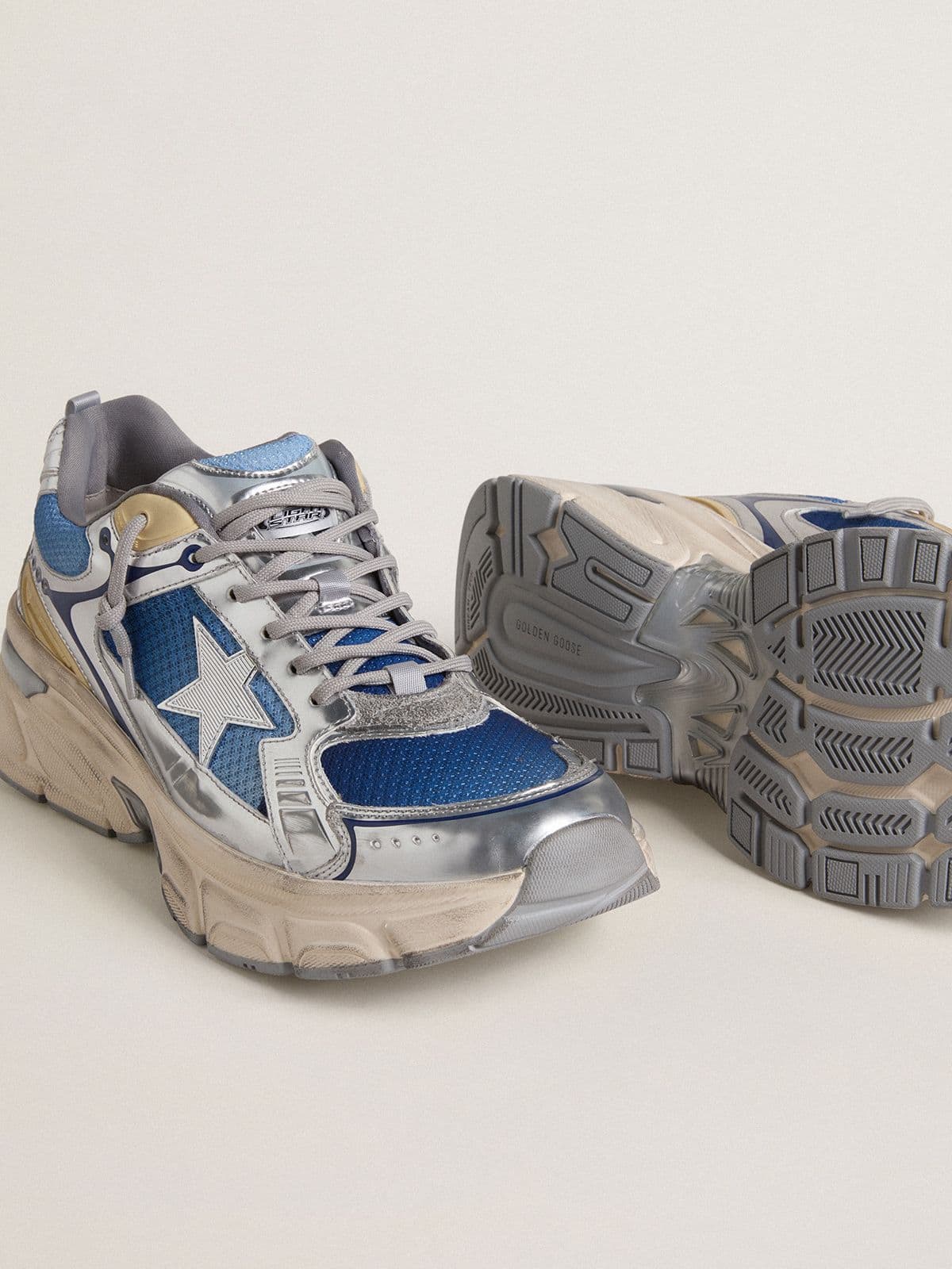 Golden Goose Women's Lightstar  in light blue mesh with white TPU star and silver bio-based inserts