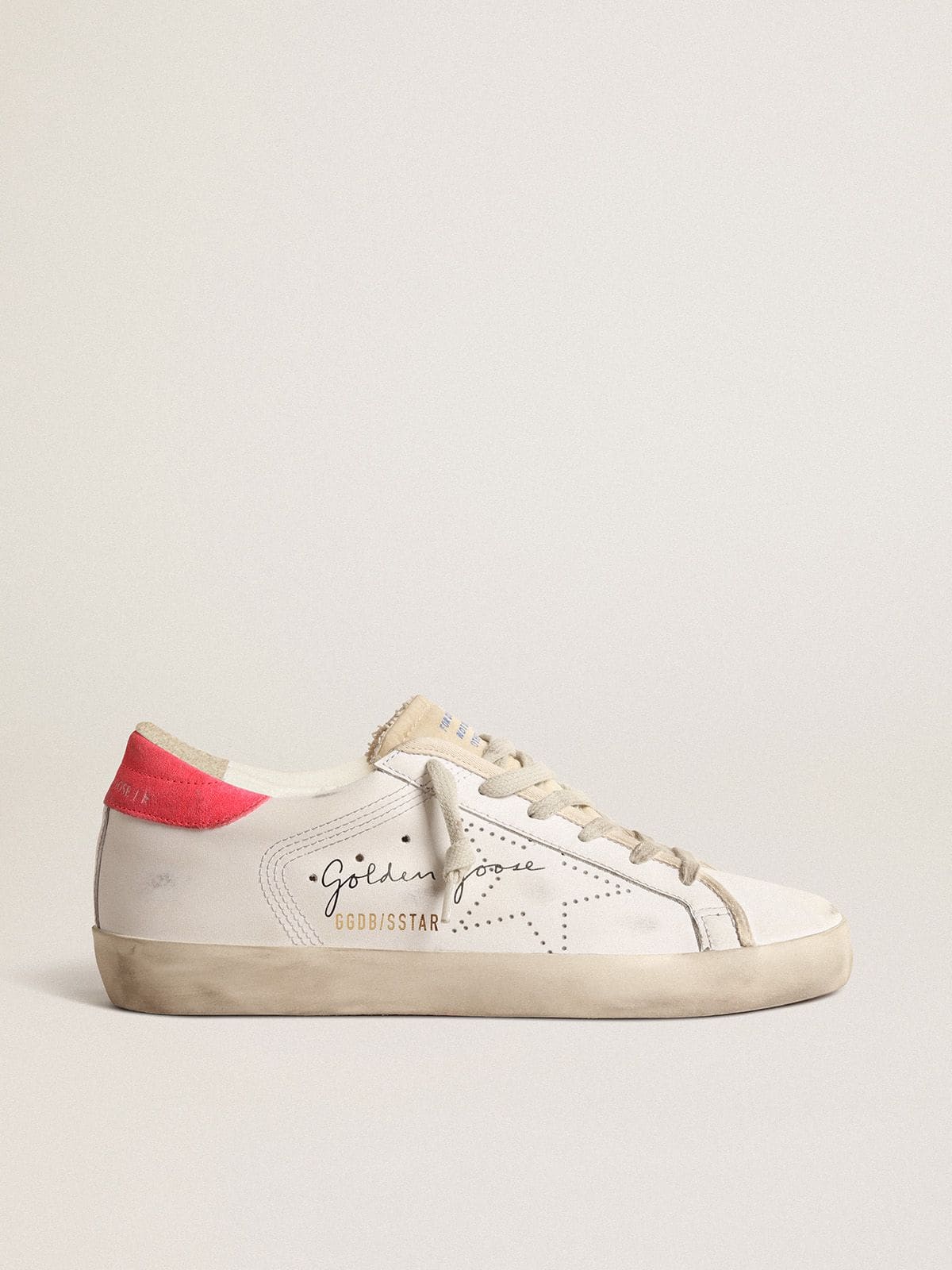 Golden Goose Women's white leather Super-Star with perforated star and fuchsia nylon heel tab