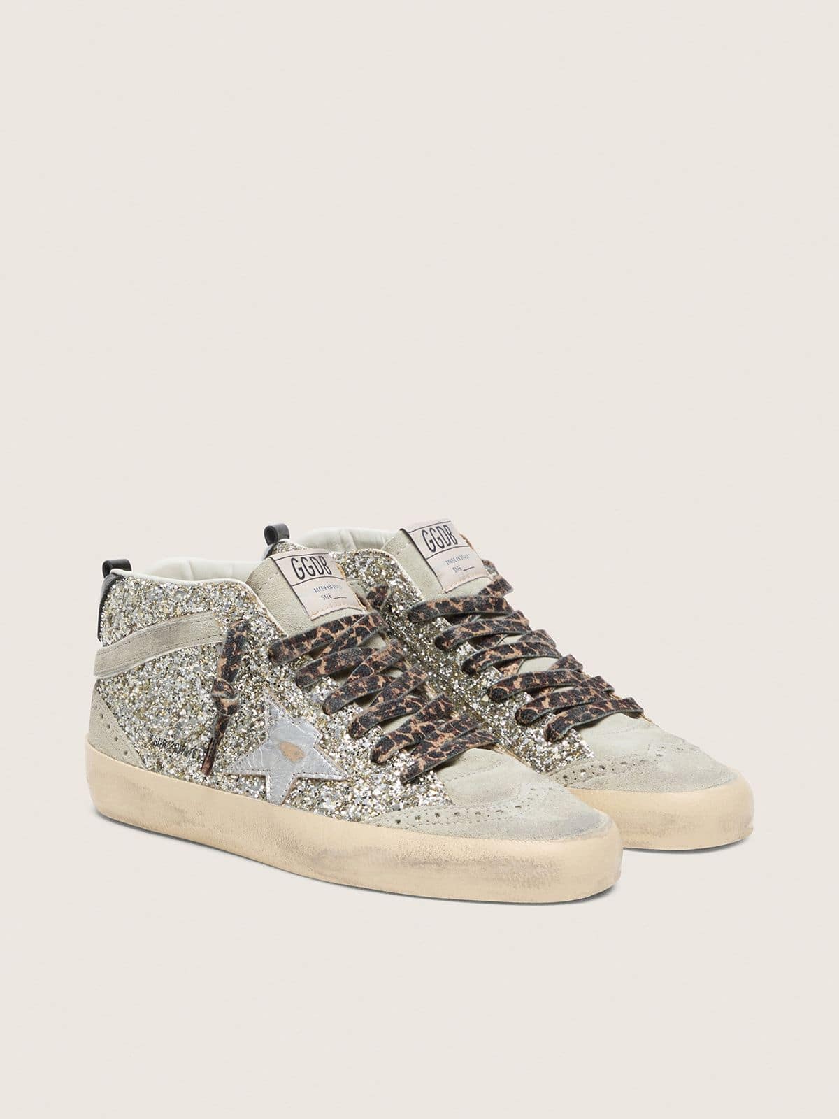 Golden Goose Mid Star  in silver glitter with silver metallic leather star
