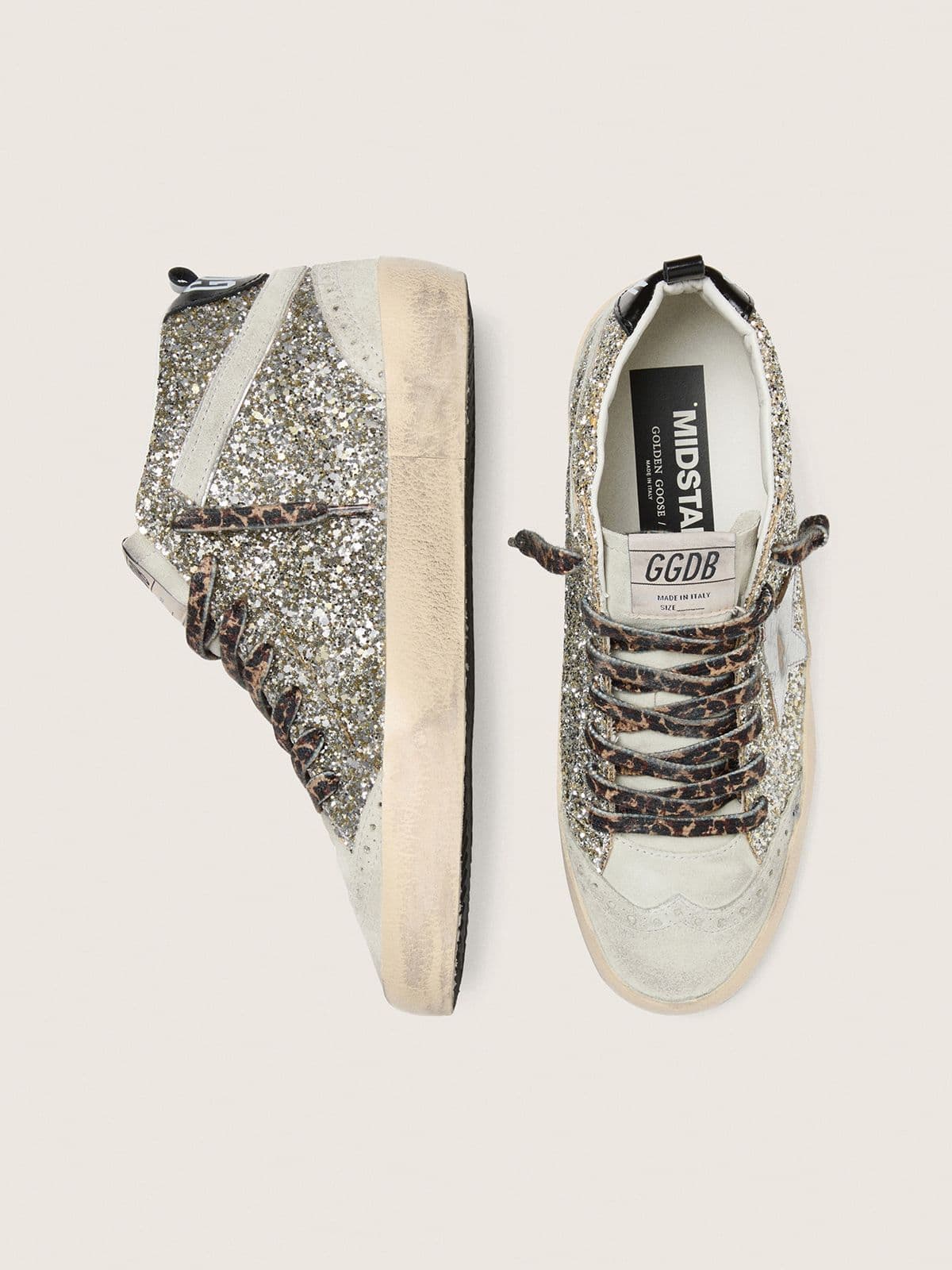 Golden Goose Mid Star  in silver glitter with silver metallic leather star
