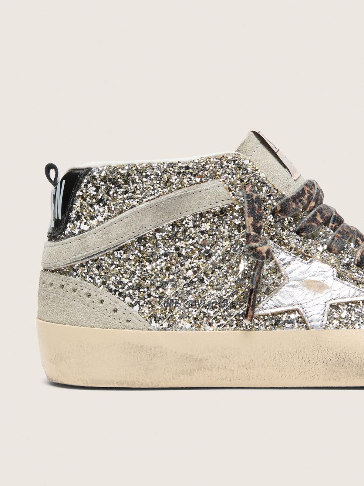 Golden Goose Mid Star  in silver glitter with silver metallic leather star