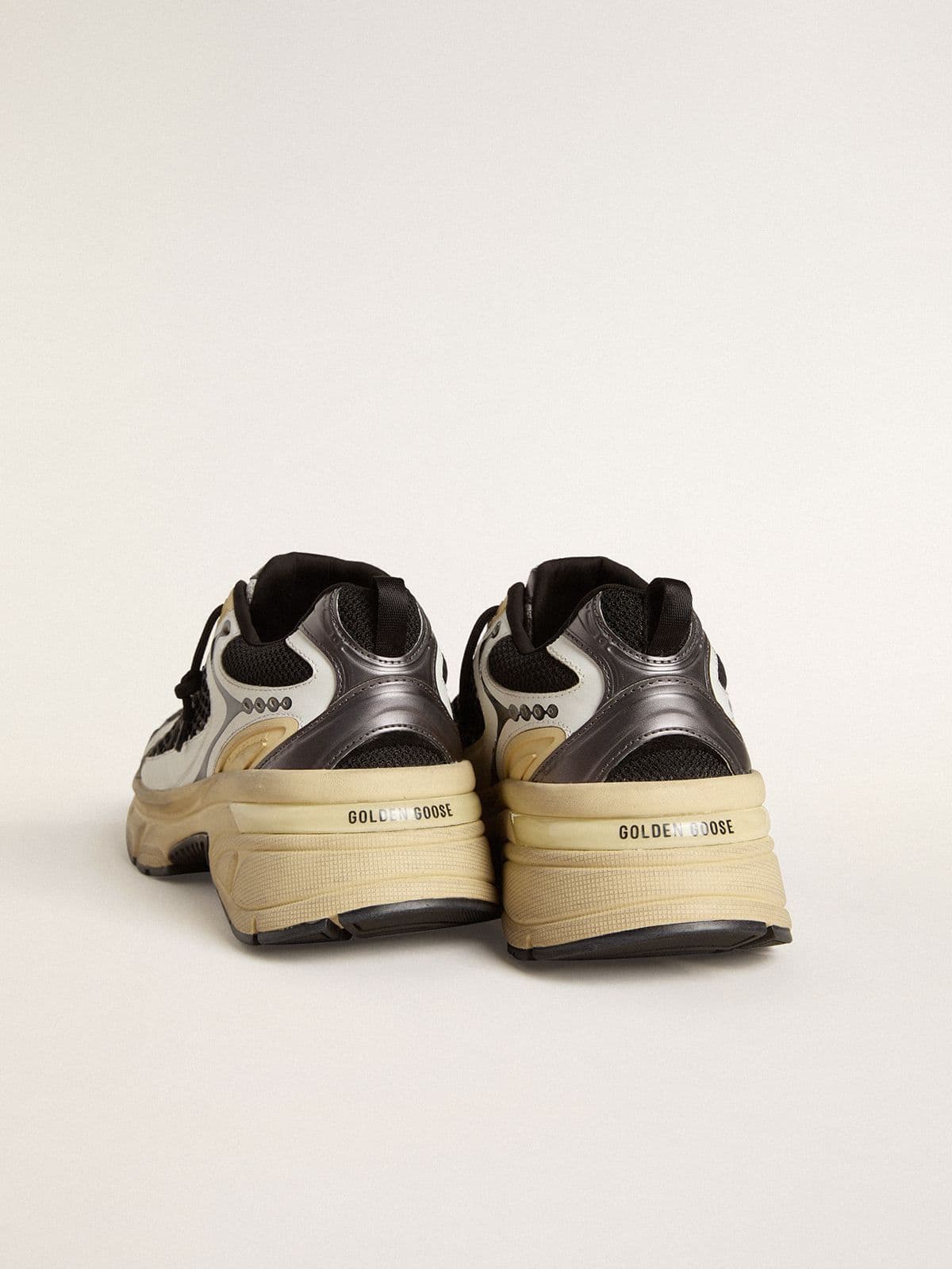Golden Goose Women’s Lightstar in white leather and black mesh with black TPU star