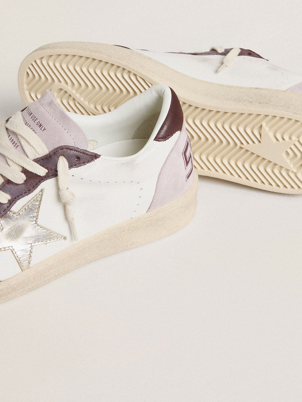 Golden Goose Women's Ball Star LTD in nappa with platinum foiled leather star and burgundy nubuck leather heel tab