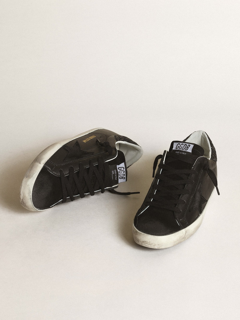 Golden Goose Women's Super-Star in black nappa with black star and glitter heel tab