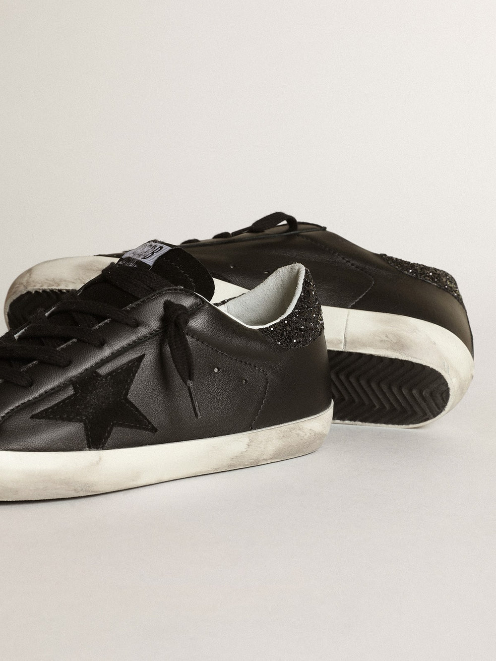 Golden Goose Women's Super-Star in black nappa with black star and glitter heel tab