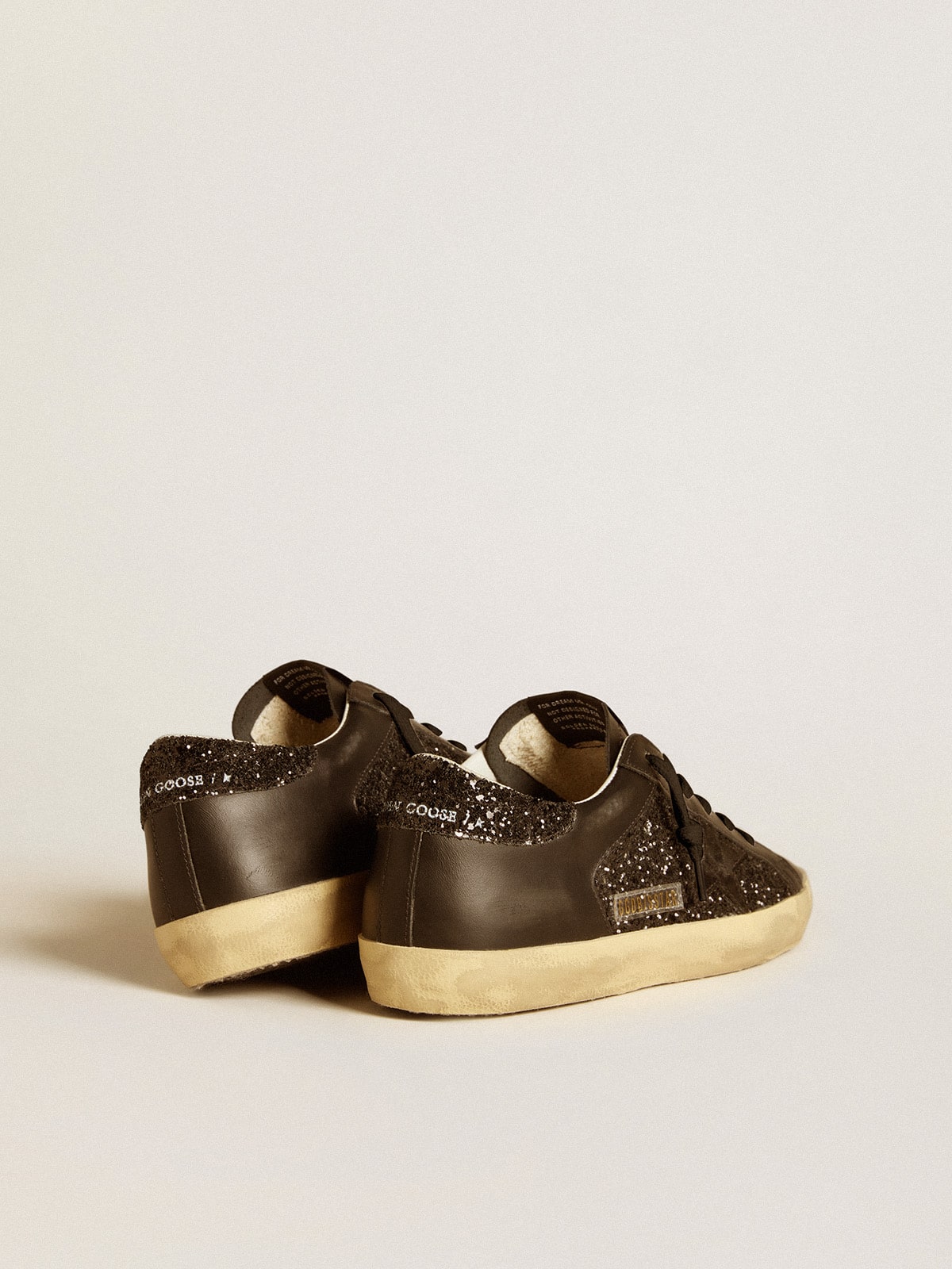 Golden Goose Women's Super-Star in black glitter with black suede star and leather inserts