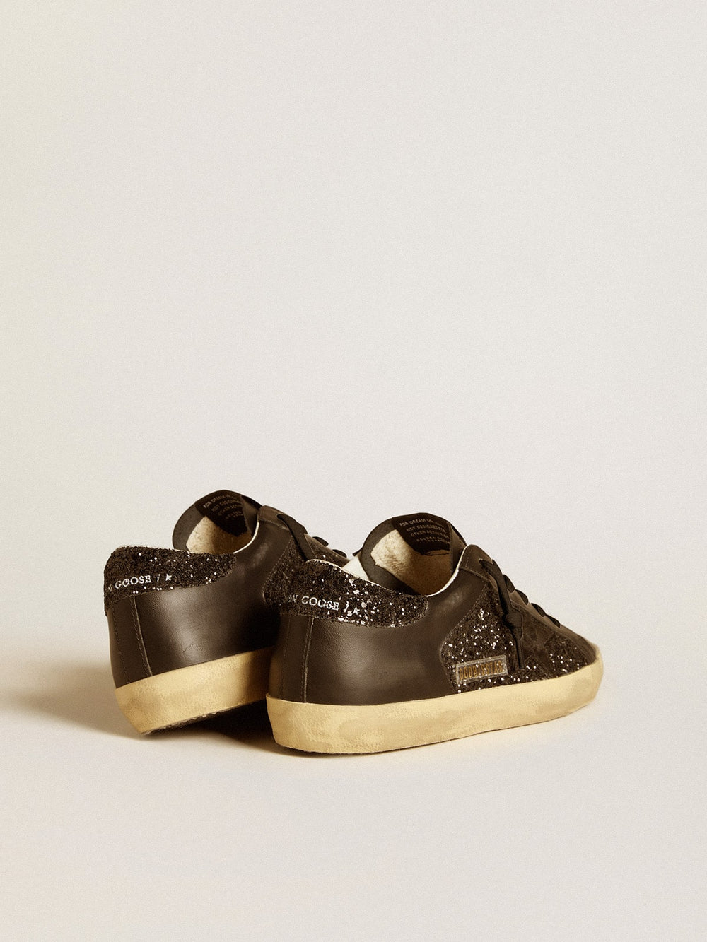 Golden Goose Women's Super-Star in black glitter with black suede star and leather inserts
