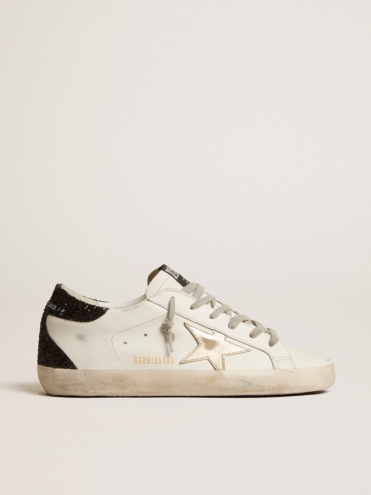 Golden Goose Women's Super-Star with gold star and black glitter heel tab