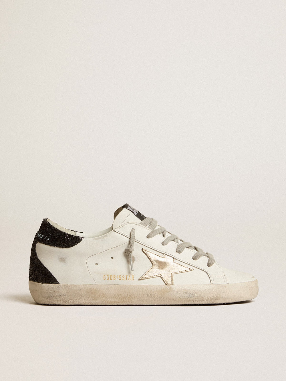 Golden Goose Women's Super-Star with gold star and black glitter heel tab