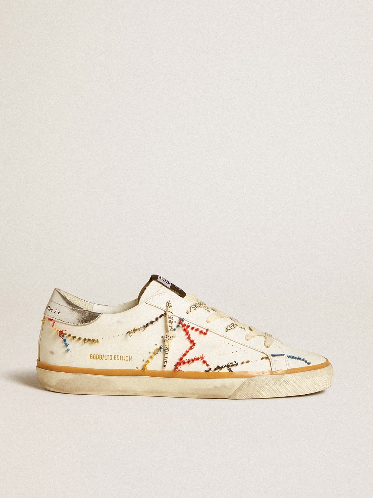 Golden Goose Women’s Super-Star LTD with perforated star and metallic leather heel tab