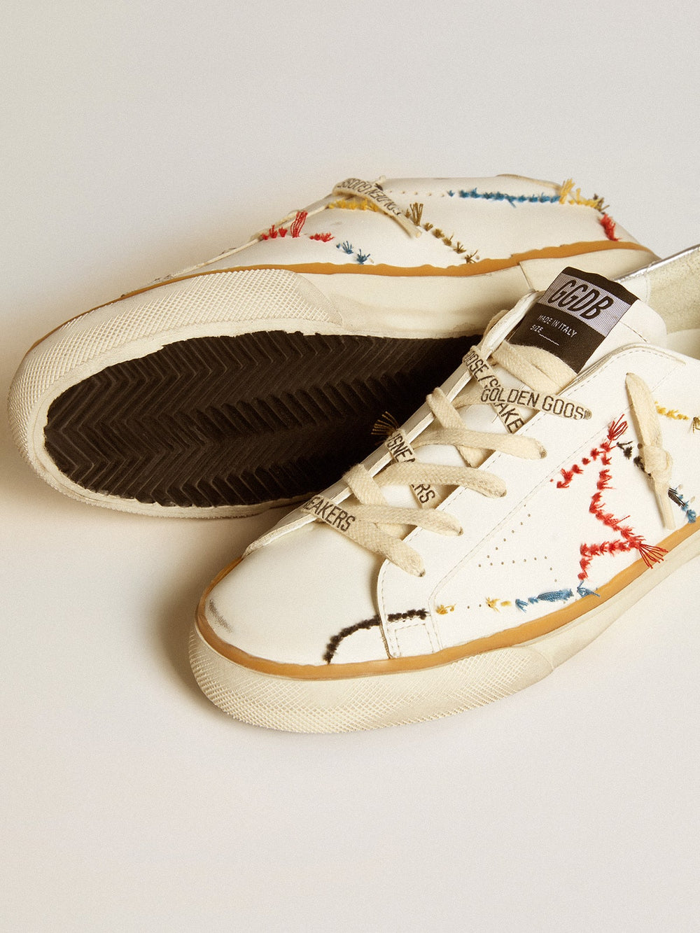 Golden Goose Women’s Super-Star LTD with perforated star and metallic leather heel tab